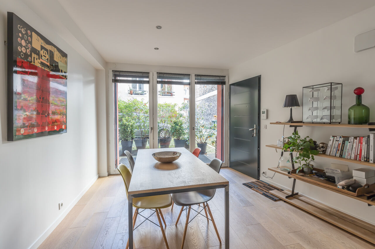 Loft-style triplex overlooking courtyard