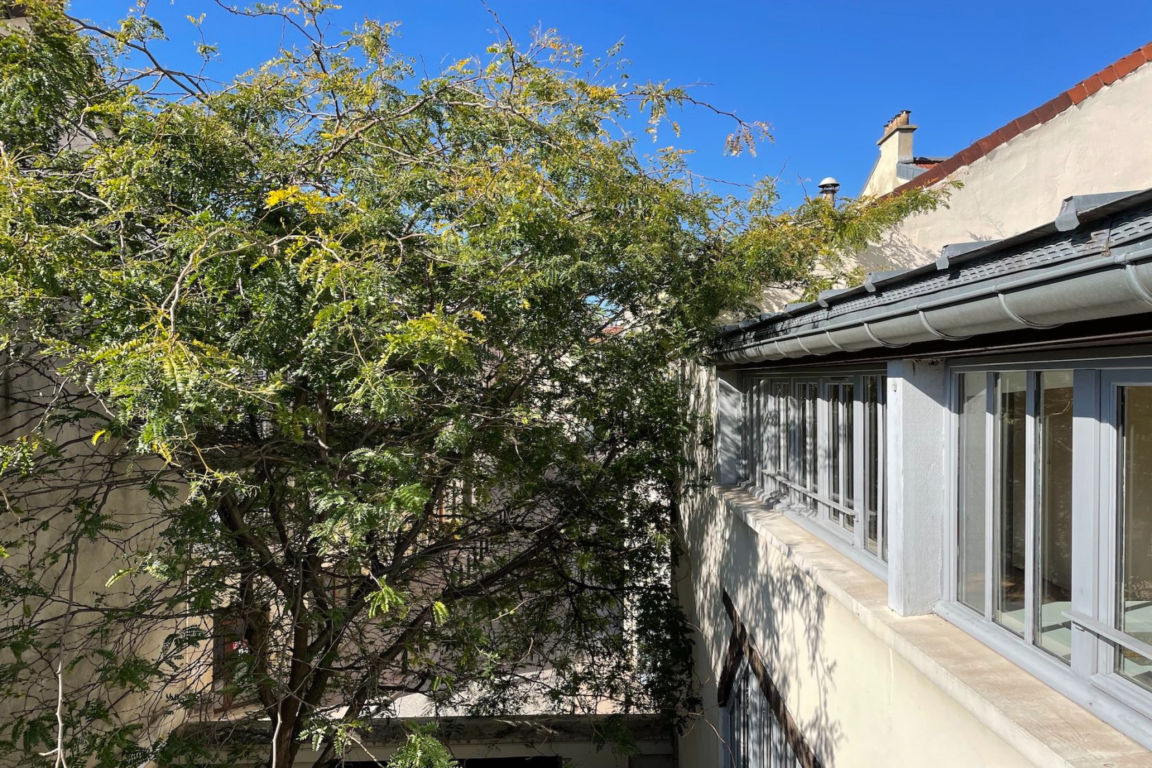 Former workshop on the top floor with patio