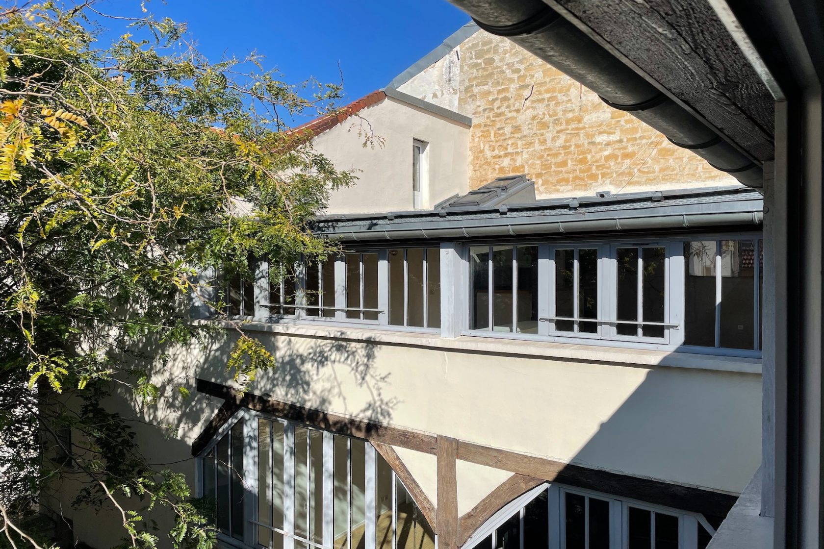 Former workshop on the top floor with patio