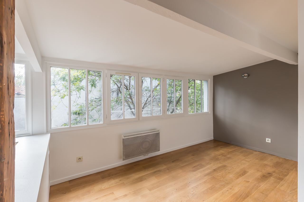 Former workshop on the top floor with patio
