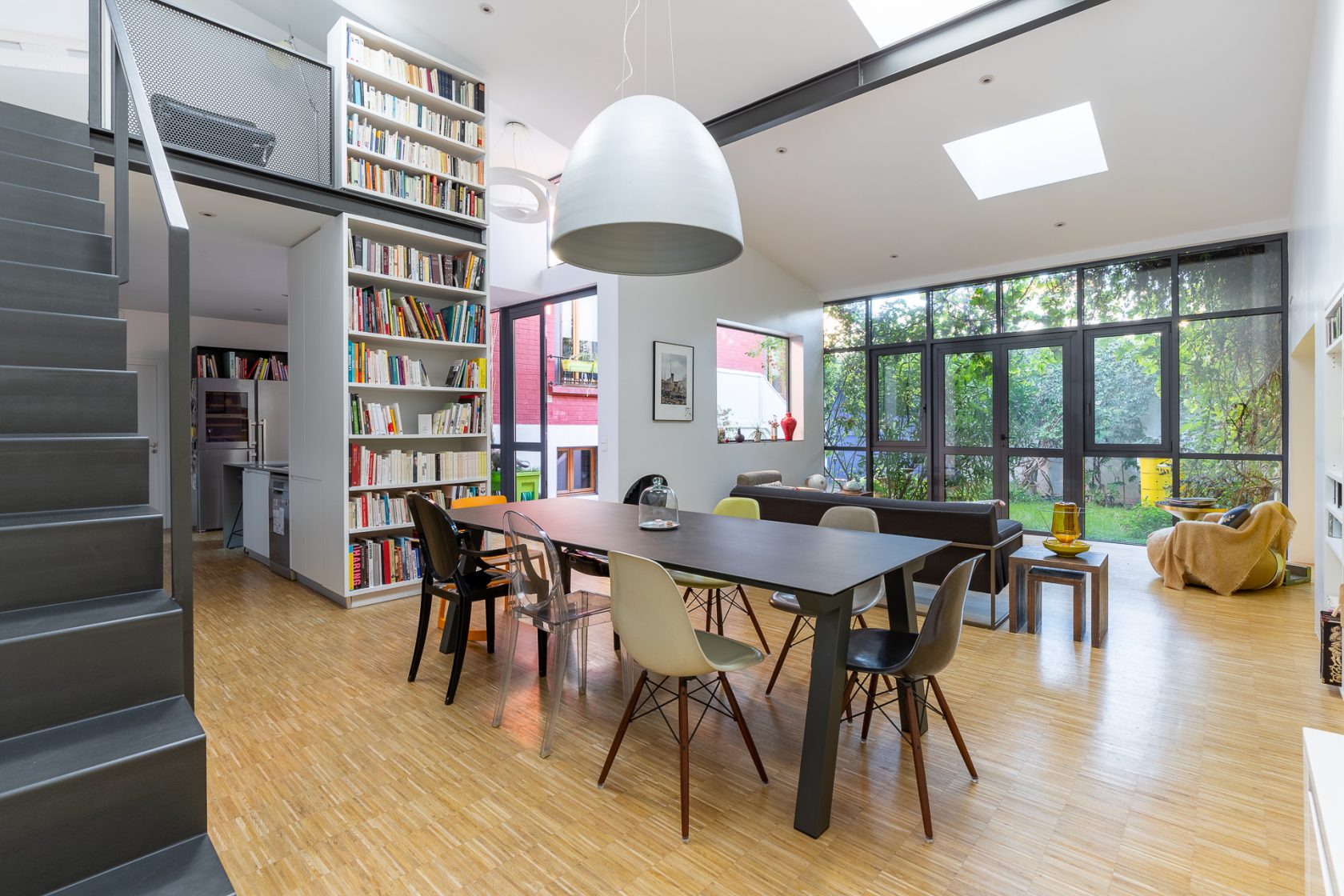 Renovated house and workshop with green exterior
