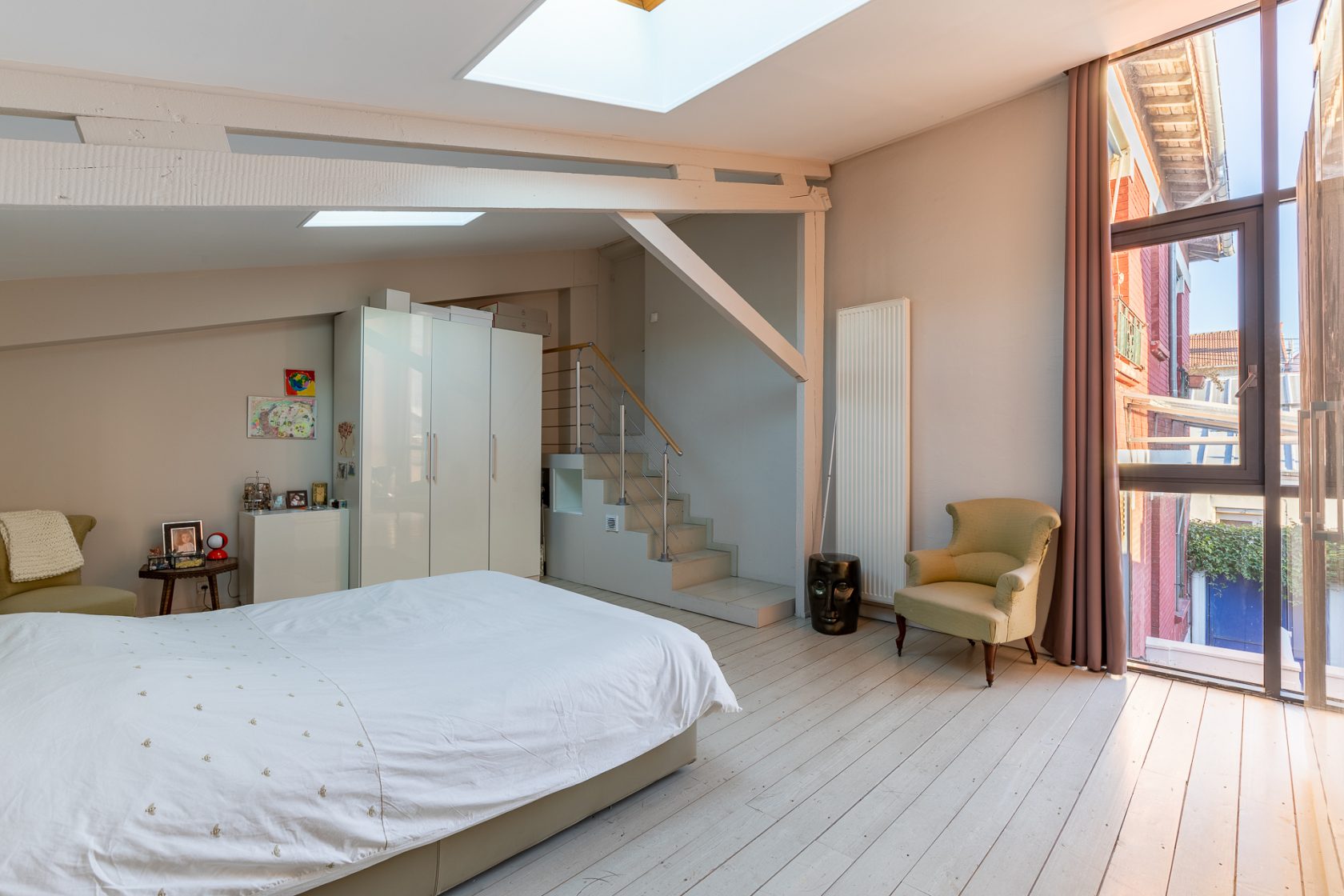 Renovated house and workshop with green exterior
