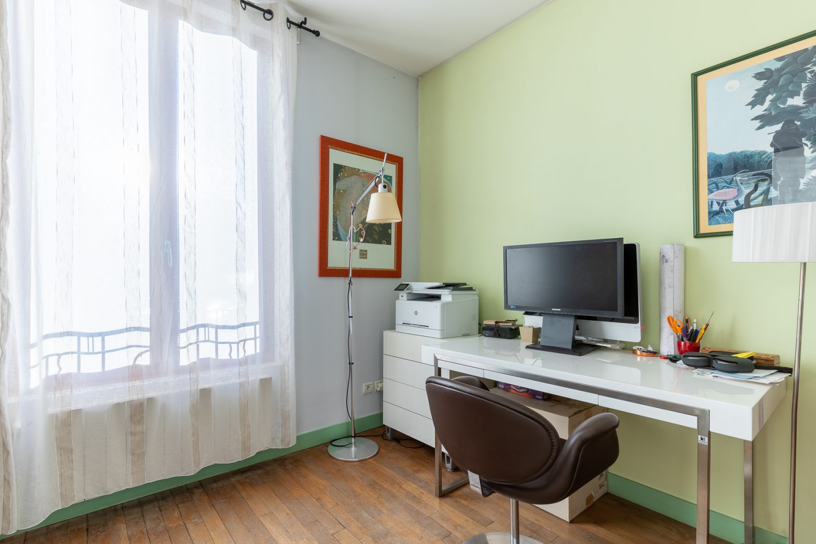 Renovated house and workshop with green exterior