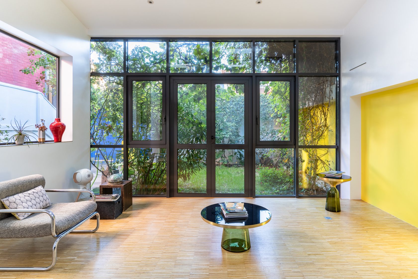 Renovated house and workshop with green exterior