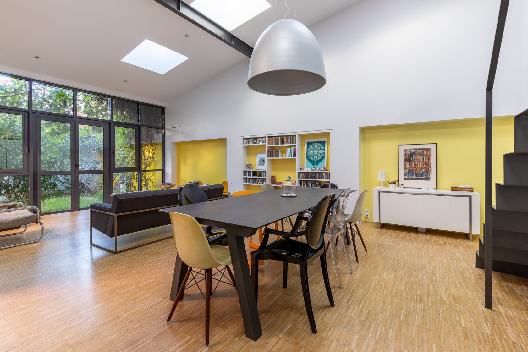 Renovated house and workshop with green exterior