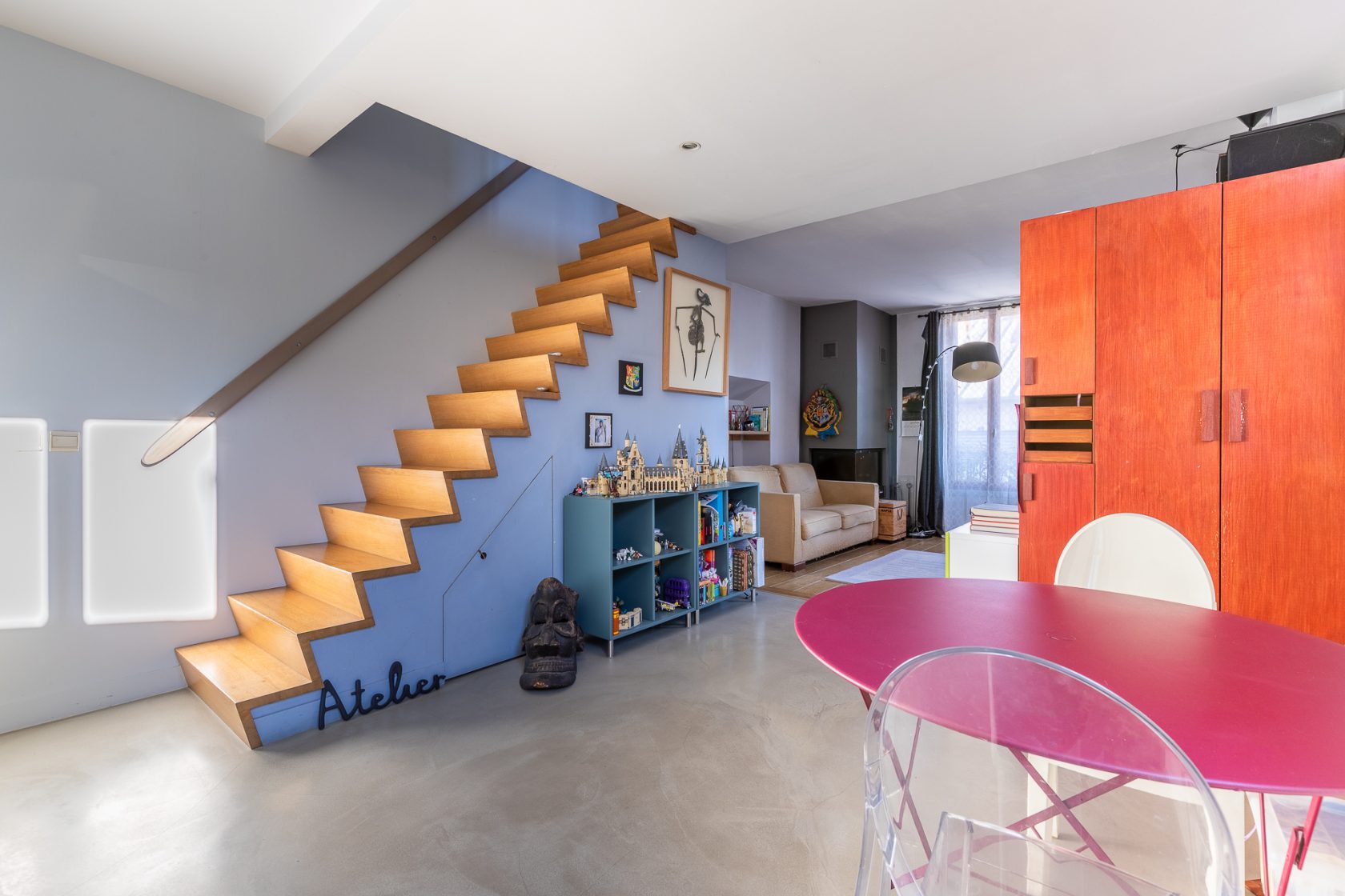 Renovated house and workshop with green exterior