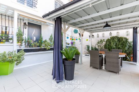 Maison avec grande terrasse et box