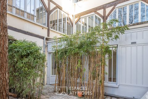 Loft-style duplex in a former garage-workshop