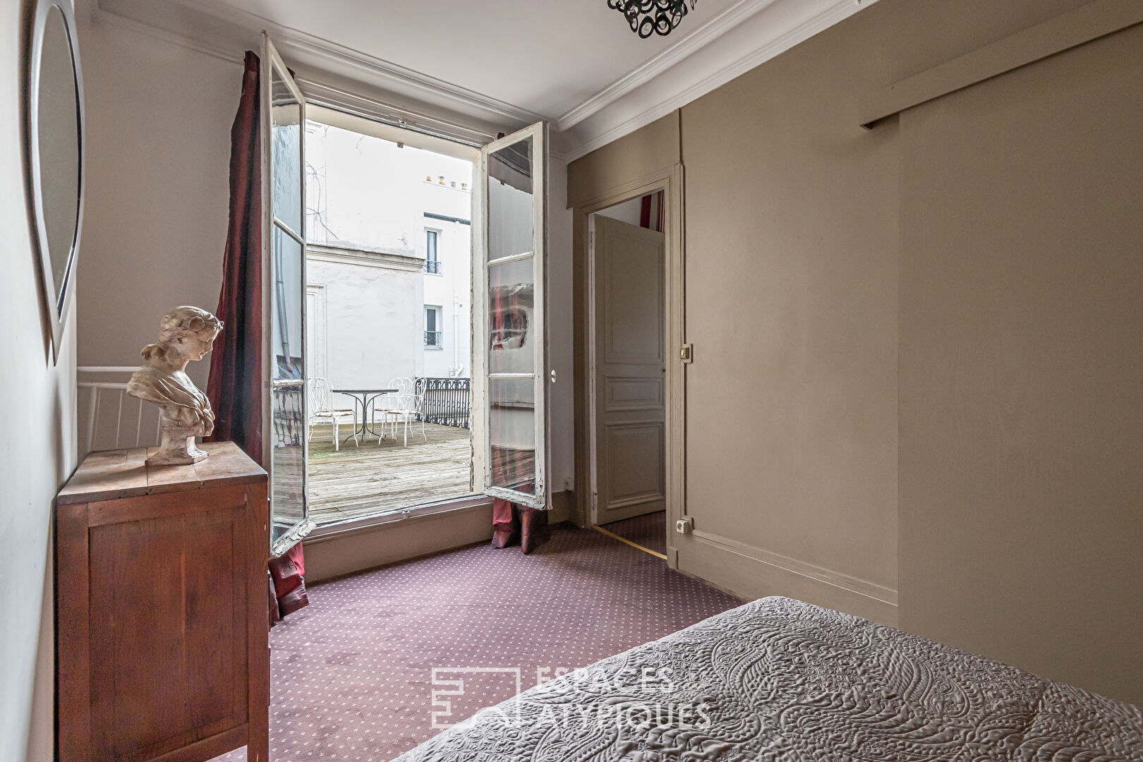 Appartement et ancien atelier de photographe avec terrasse à repenser