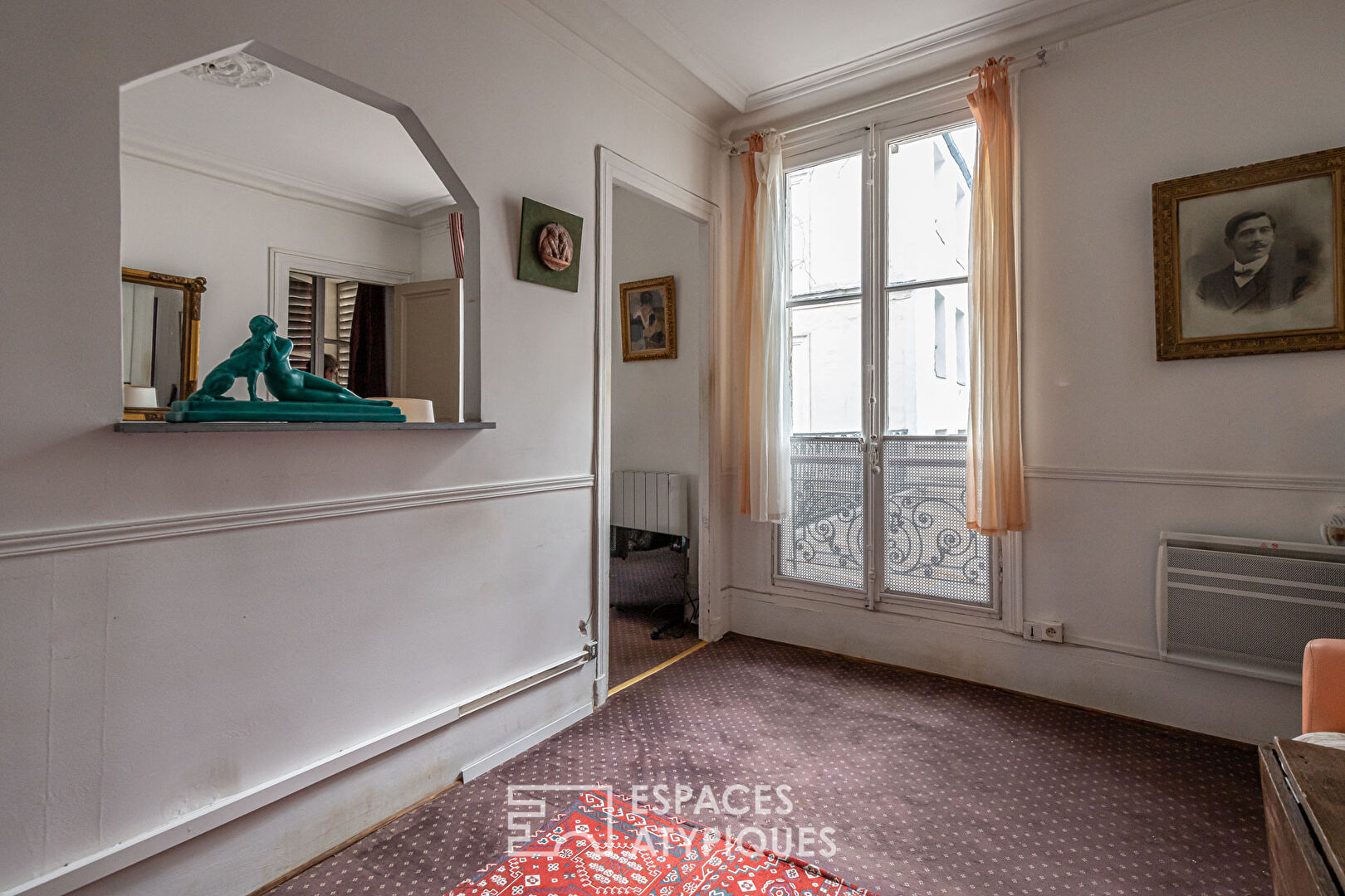 Appartement et ancien atelier de photographe avec terrasse à repenser