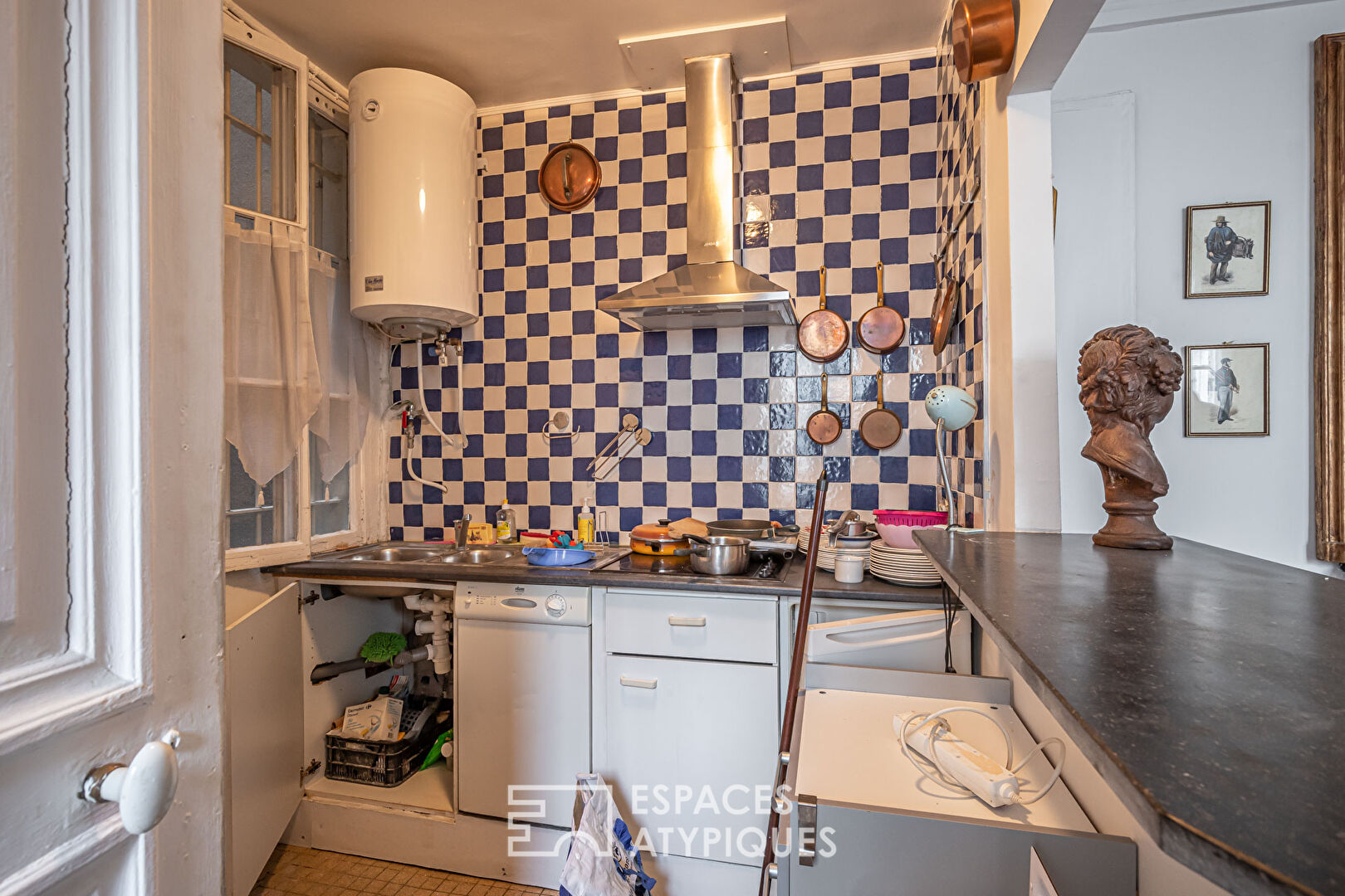 Appartement et ancien atelier de photographe avec terrasse à repenser