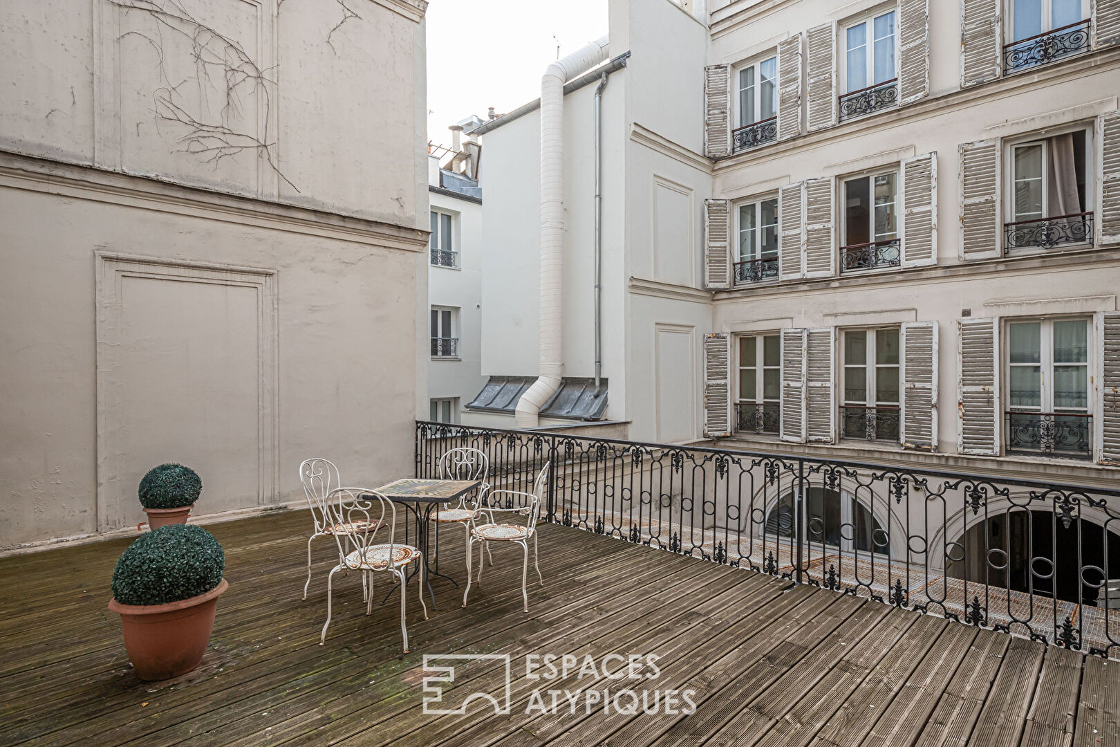 Appartement et ancien atelier de photographe avec terrasse à repenser