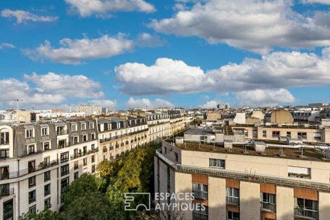 Dernier étage avec vue dégagée sur les toits parisiens