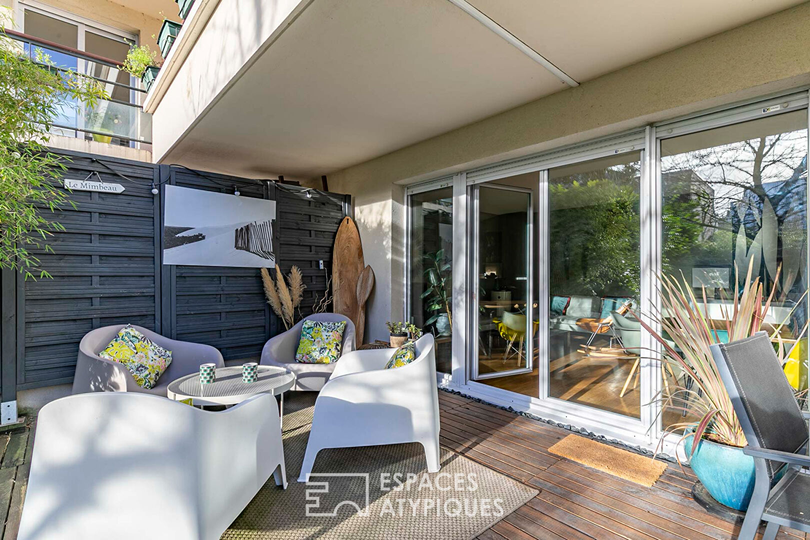 Duplex terrasse et son jardin arboré