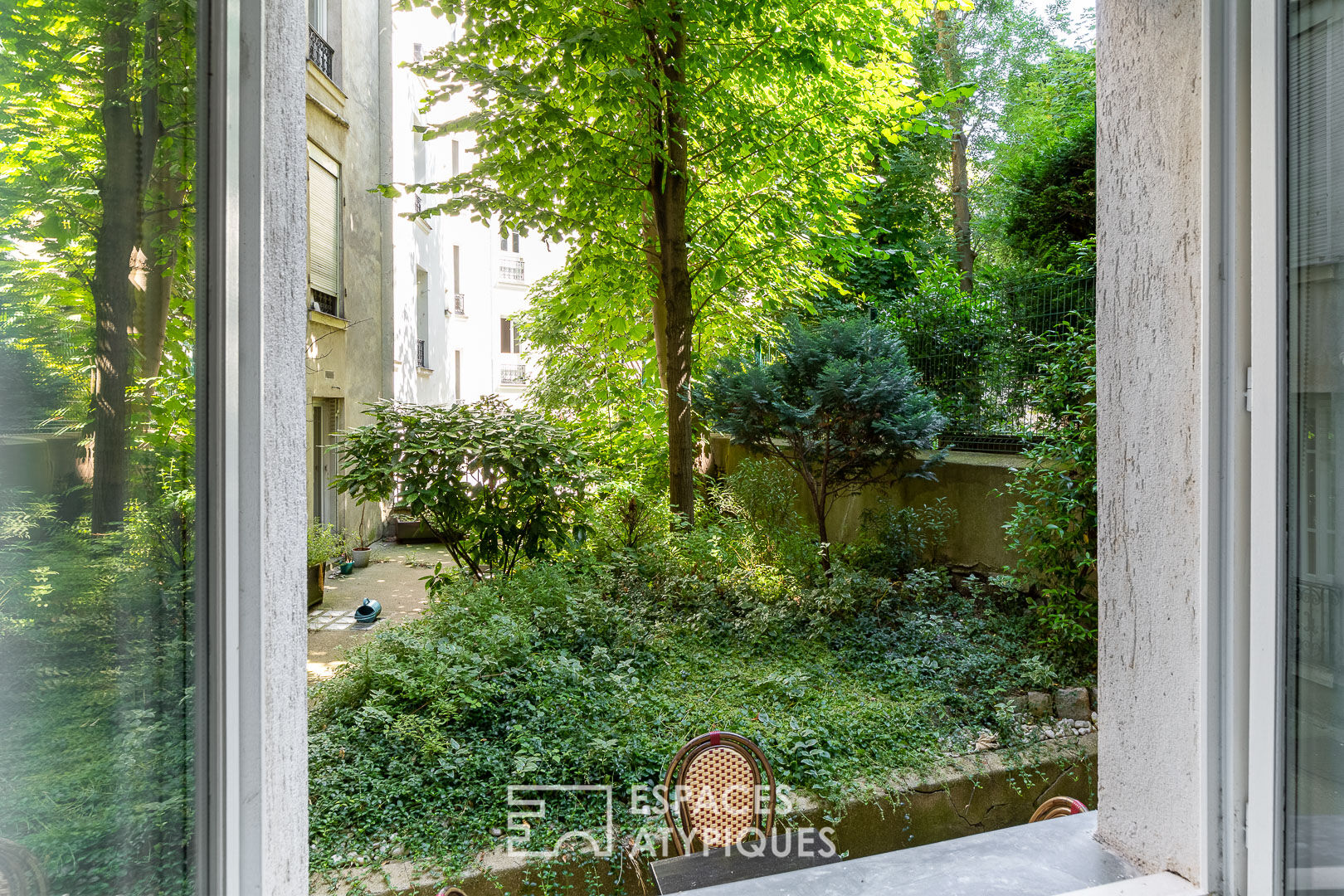 Charming Montmartre apartment on tree-line courtyard