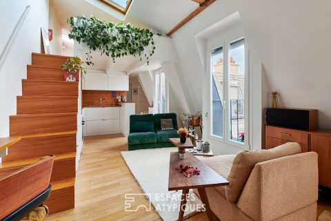 Renovated top floor apartment with balconies