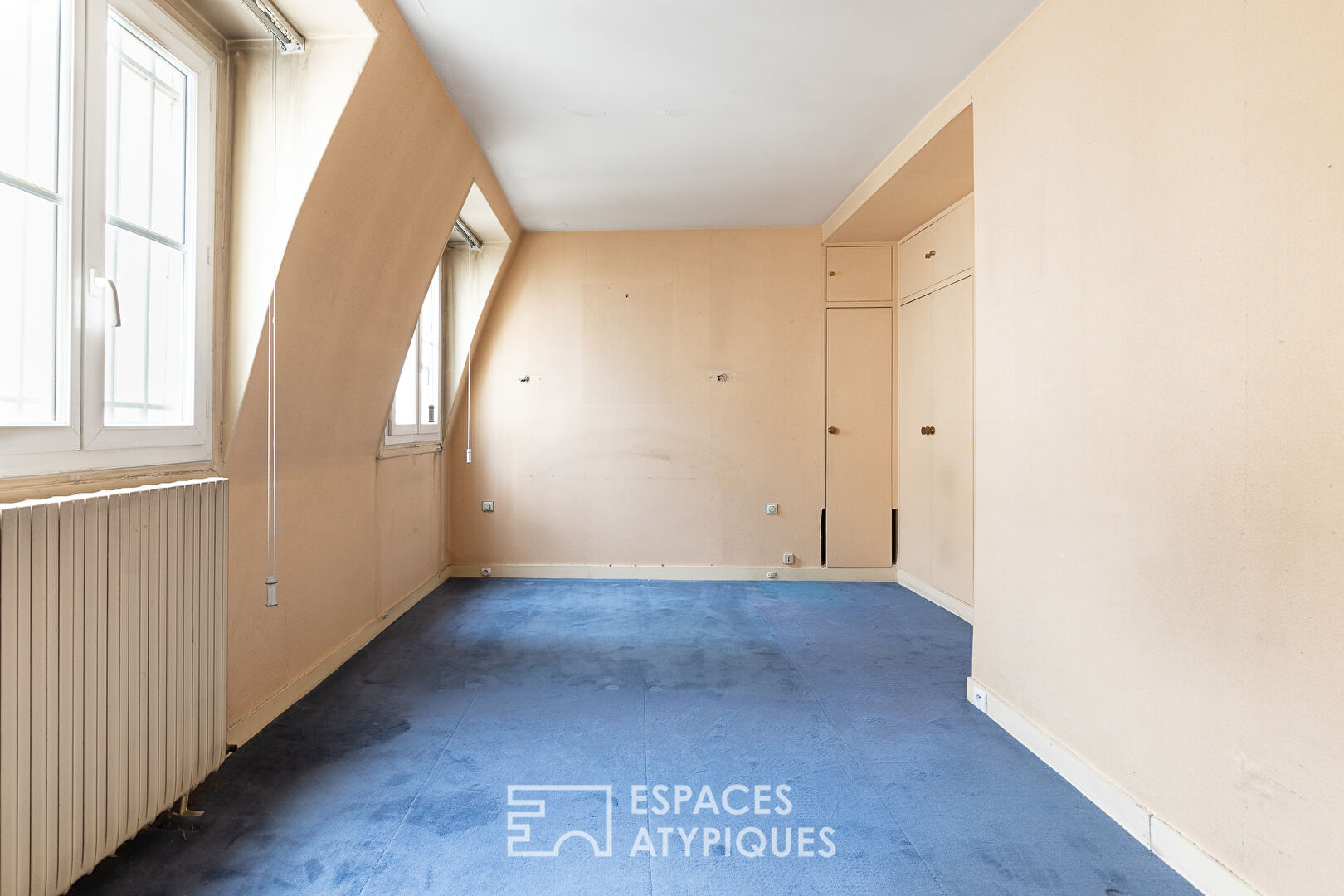 Élégant duplex en dernier étage à réinterpréter