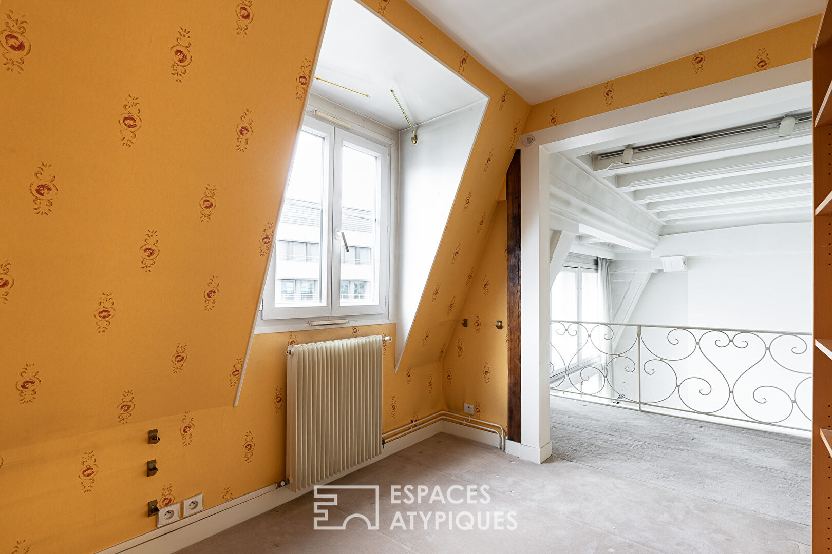 Élégant duplex en dernier étage à réinterpréter