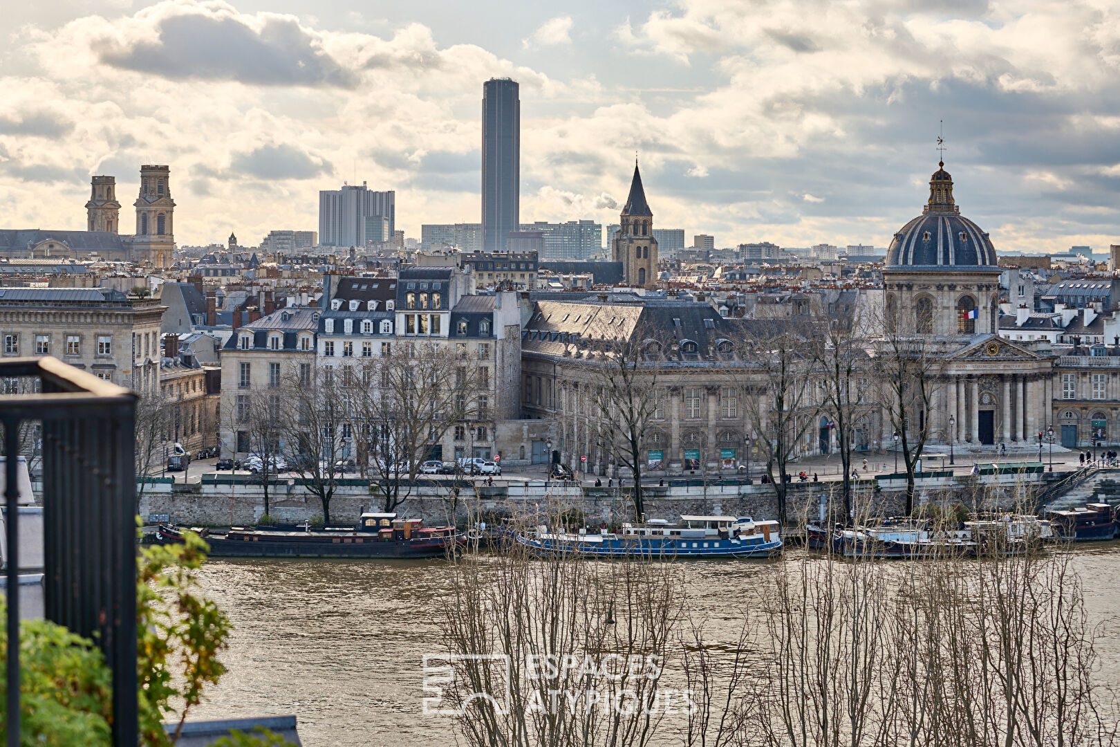 Luxurious Top-Floor Apartment in the Heart of Paris with Stunning Views of Its Iconic Landmarks