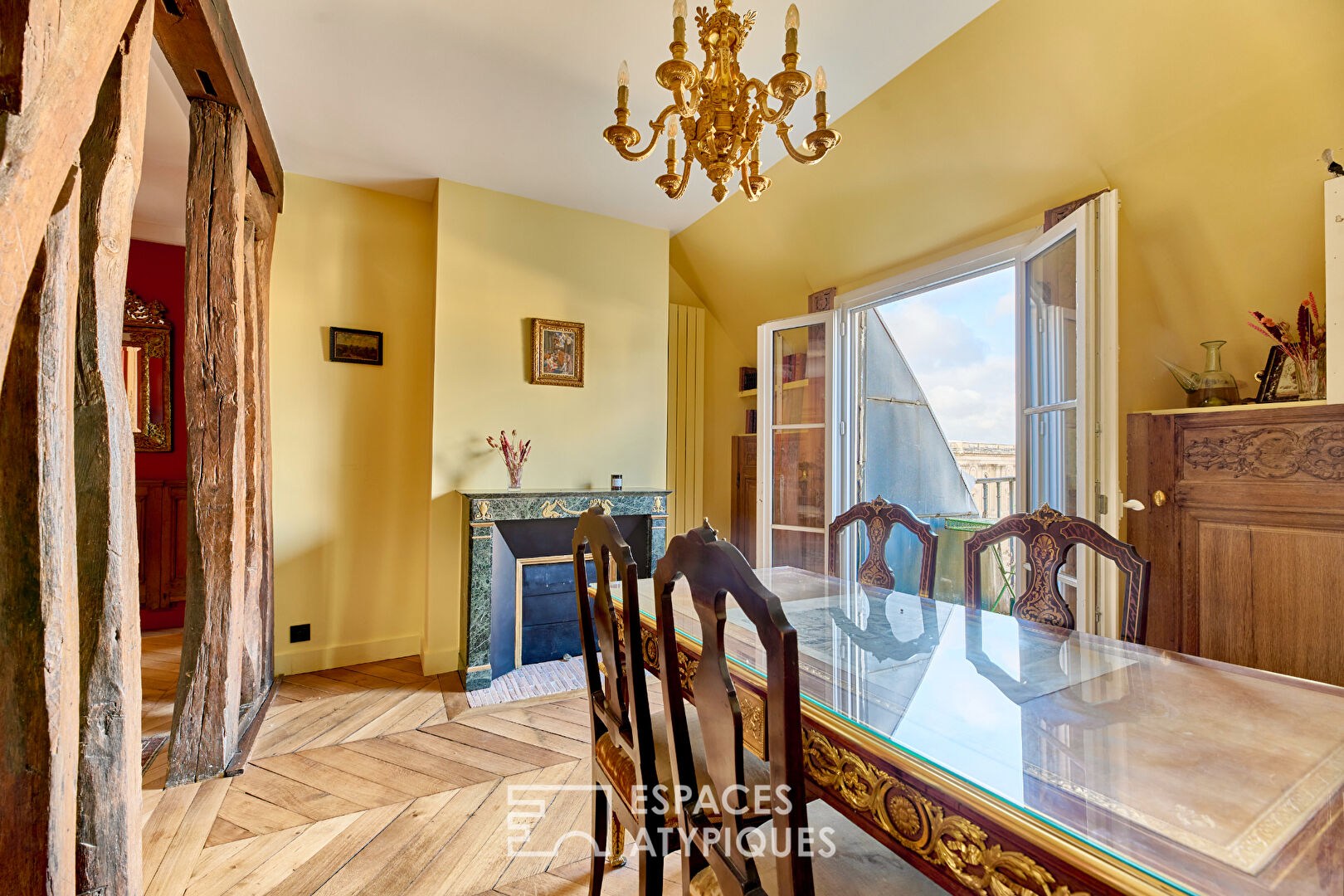 Luxurious Top-Floor Apartment in the Heart of Paris with Stunning Views of Its Iconic Landmarks