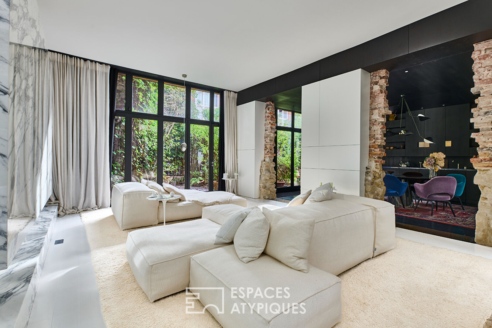 Iconique duplex esprit maison-loft à SoPi