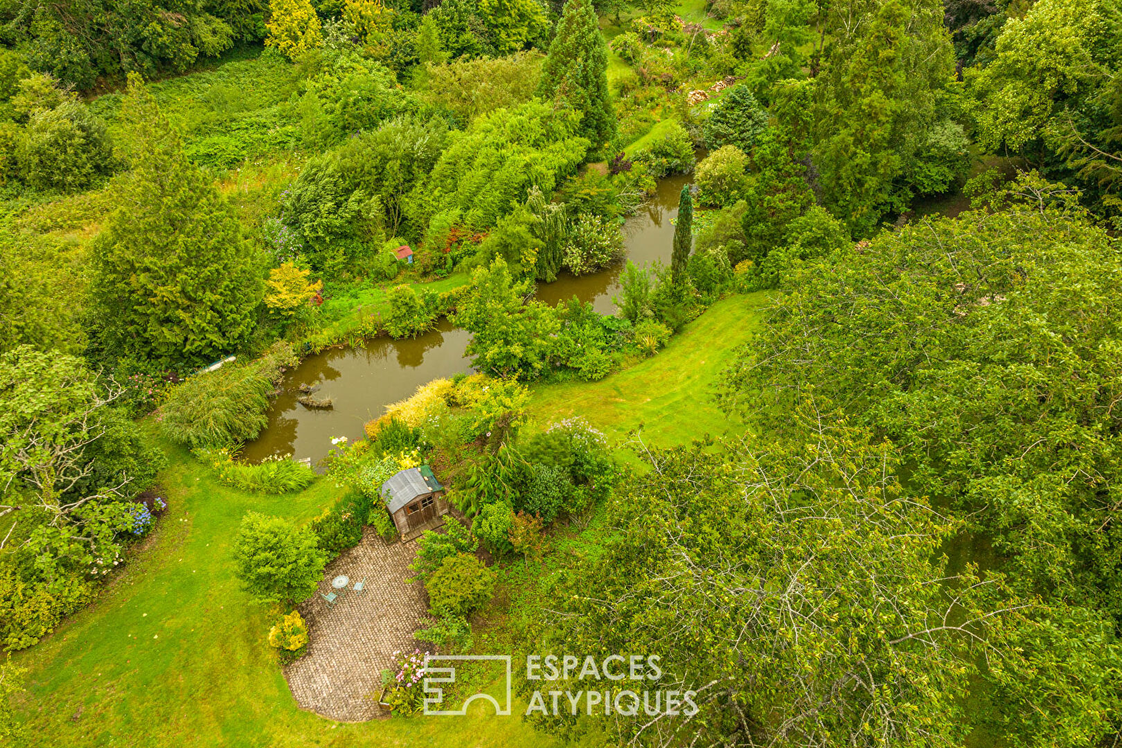 Maison familiale et son jardin exceptionnel