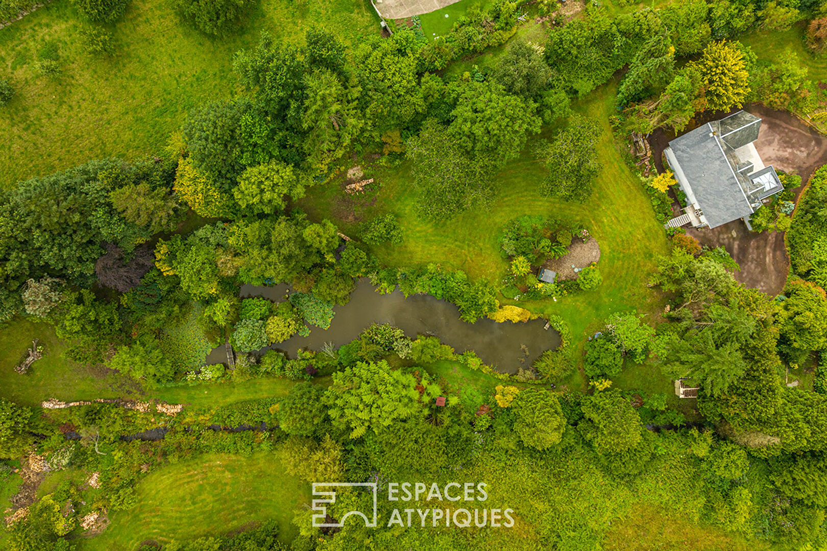 Maison familiale et son jardin exceptionnel