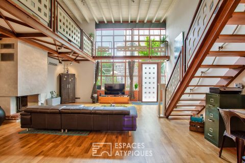 Loft dans une ancienne usine avec jardin et terrasse