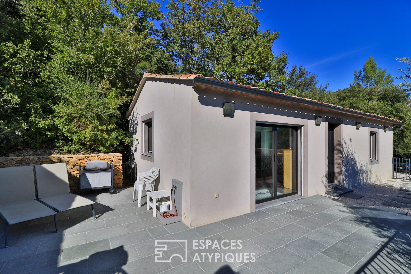 Neo-classical house with contemporary annex, nature park and swimming pool.