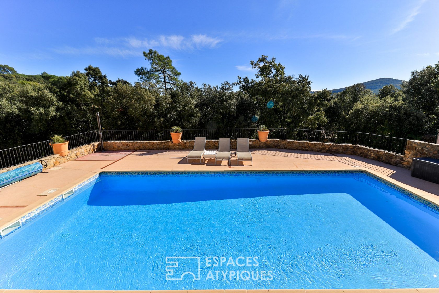 Neo-classical house with contemporary annex, nature park and swimming pool.