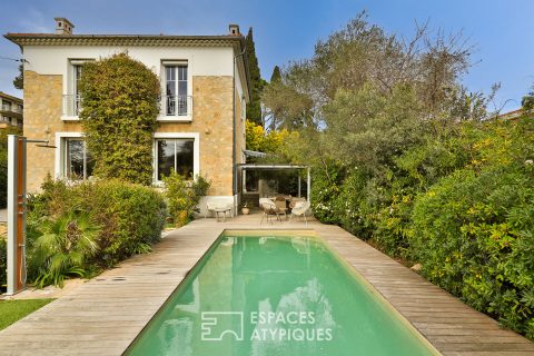 “Art Deco” house in a bubble of greenery with landscaped garden and swimming pool