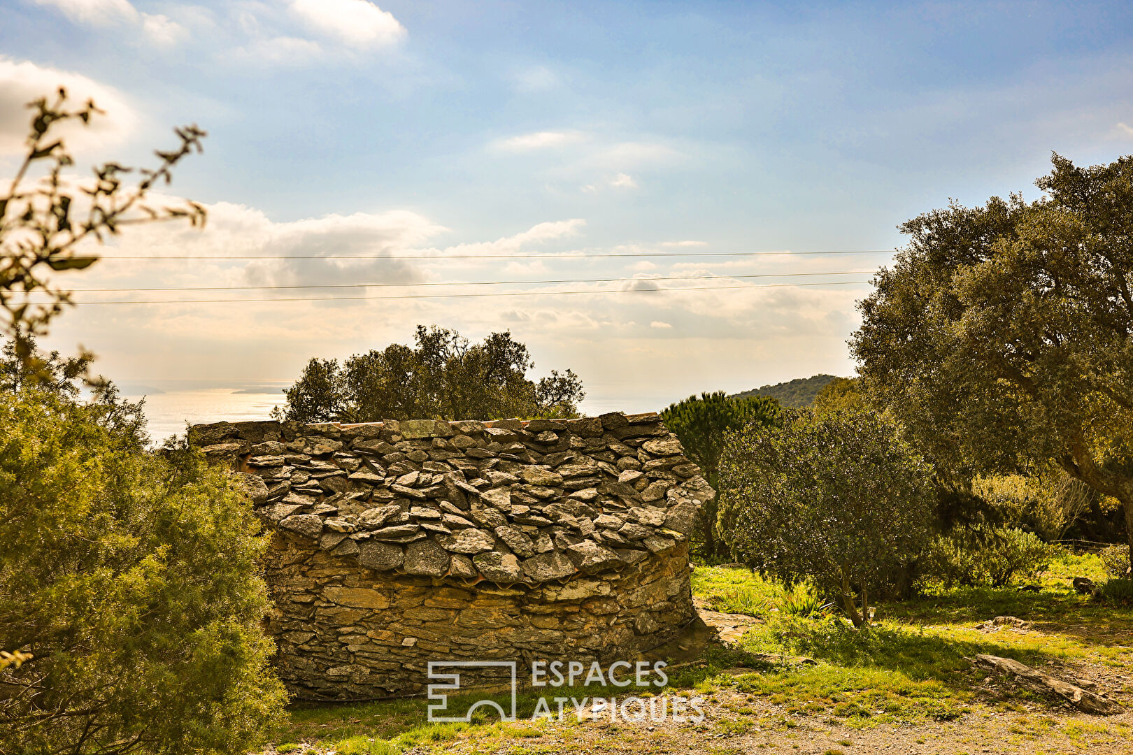 Stunning natural setting for this 17th century farmhouse facing the Mediterranean