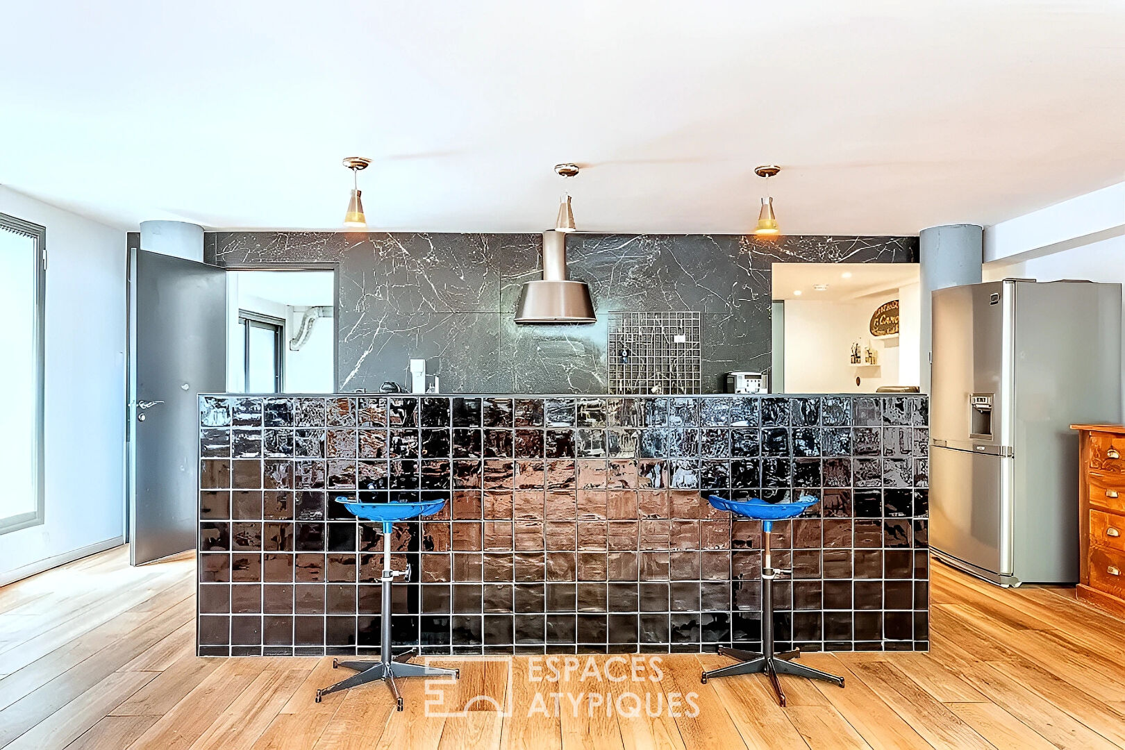 Loft industriel avec terrasse