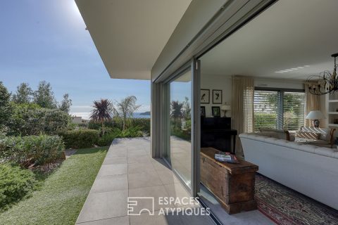 Garden level apartment with panoramic sea view