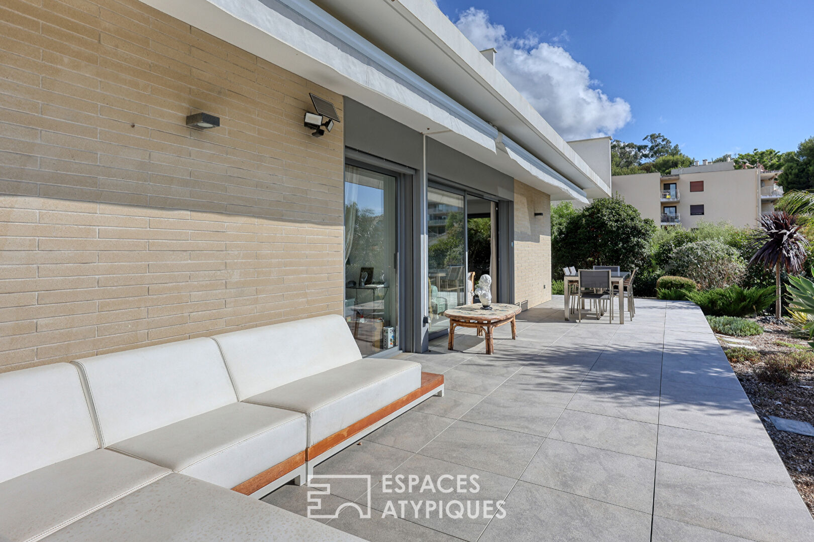 Garden level apartment with panoramic sea view