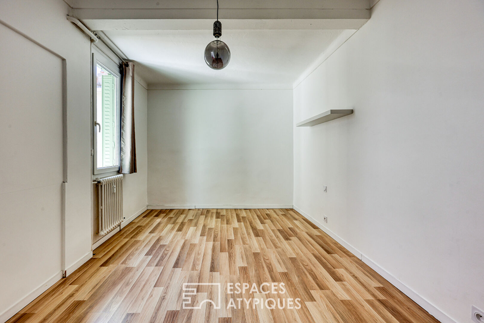 Appartement en attique dans un immeuble Art déco