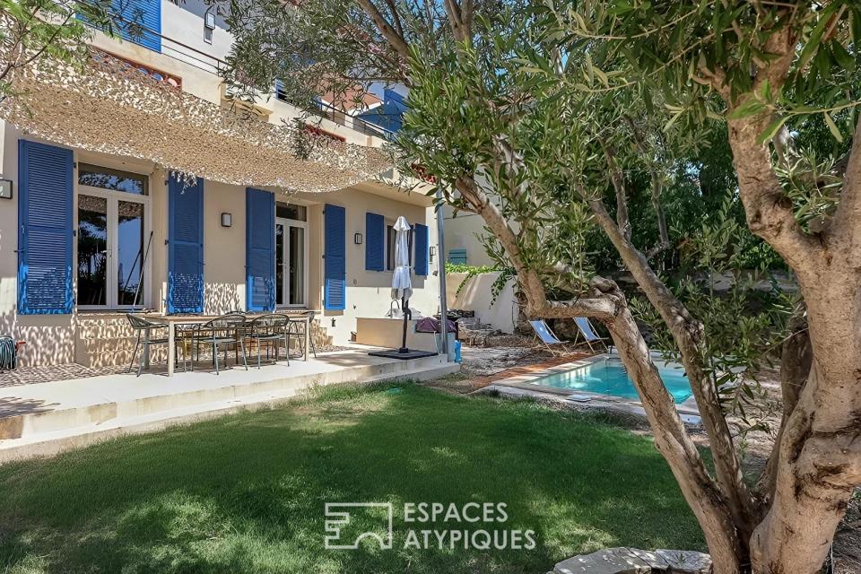 Appartement en rez de jardin avec piscine