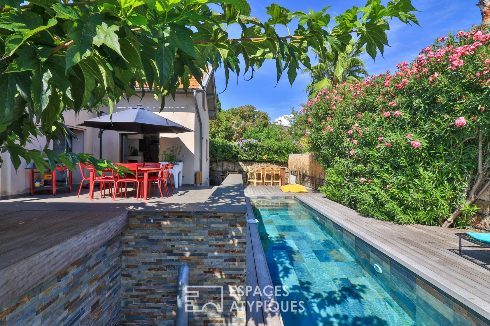 Revisited 1930s villa and swimming pool.