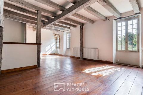 Maison au charme pittoresque et son jardin bucolique