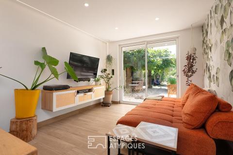 Élégante maison rénovée avec garage et grand jardin