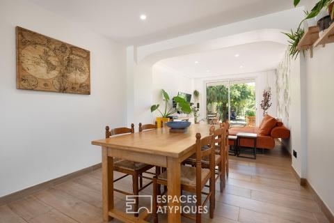 Élégante maison rénovée avec garage et grand jardin