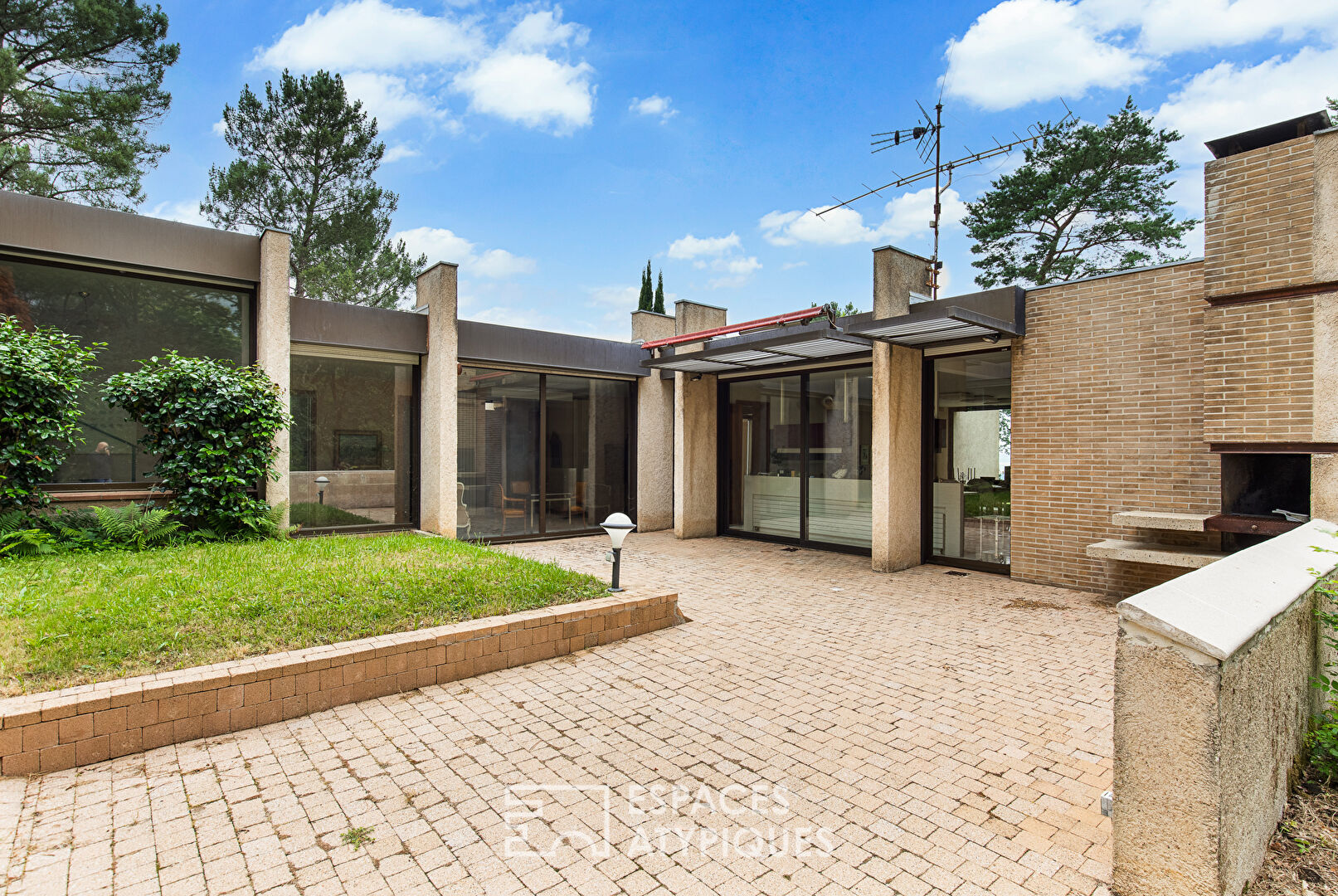 Architect house on wooded park