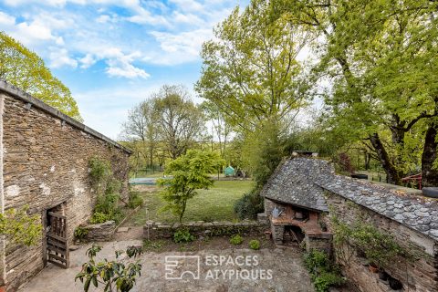 Old renovated farmhouse with outbuildings