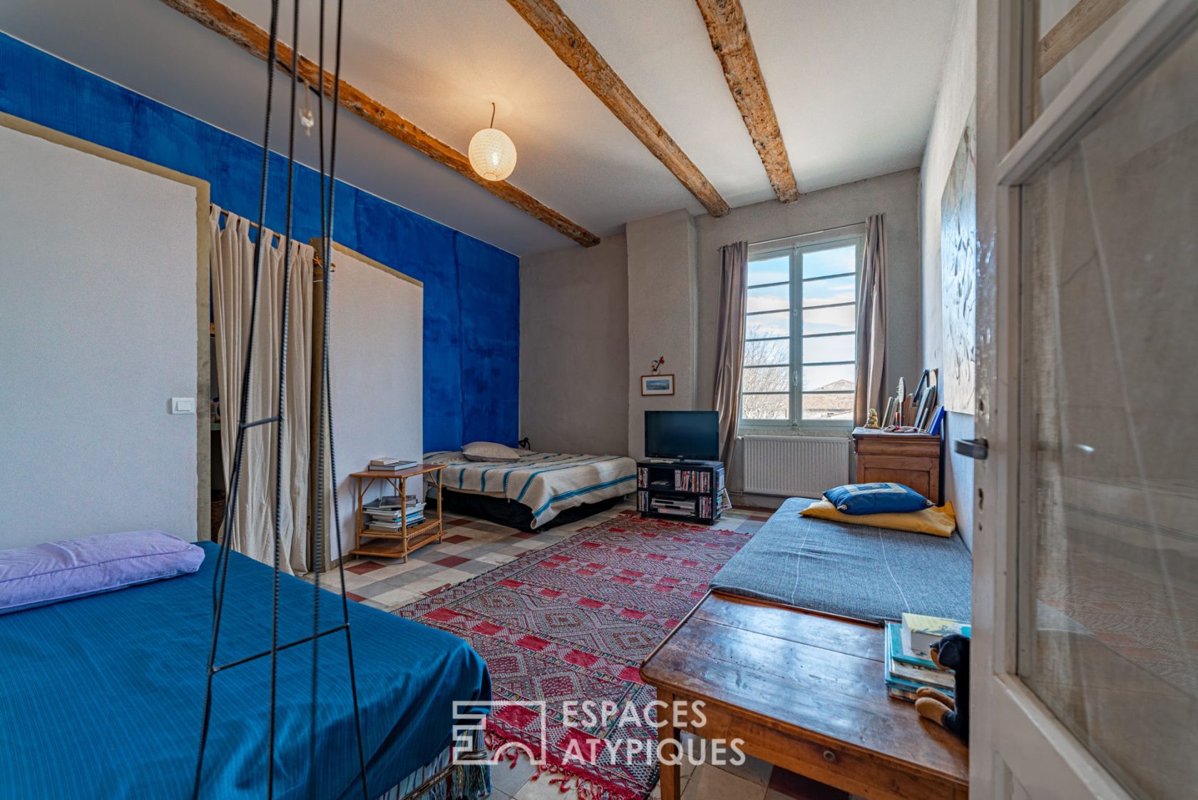 Apartment rehabilitated in a former factory and its artist’s studio