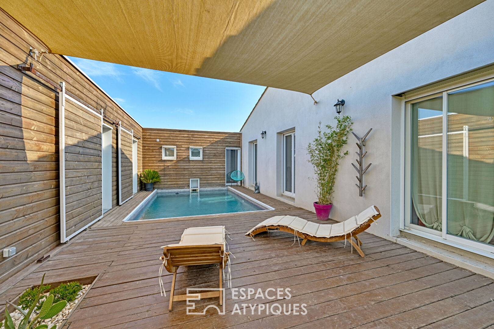 Maison contemporaine et son extension bois