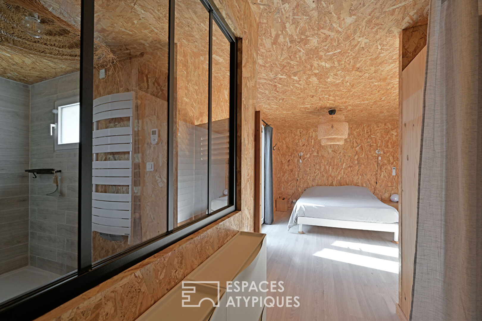 Contemporary house and its wooden extension