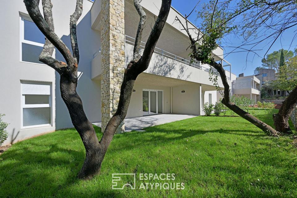 Appartement P3 avec jardin, garages et ascenseur quartier Camplanier