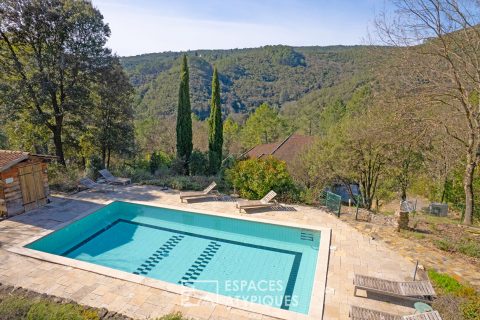 Wooden house with swimming pool and view in a haven of peace