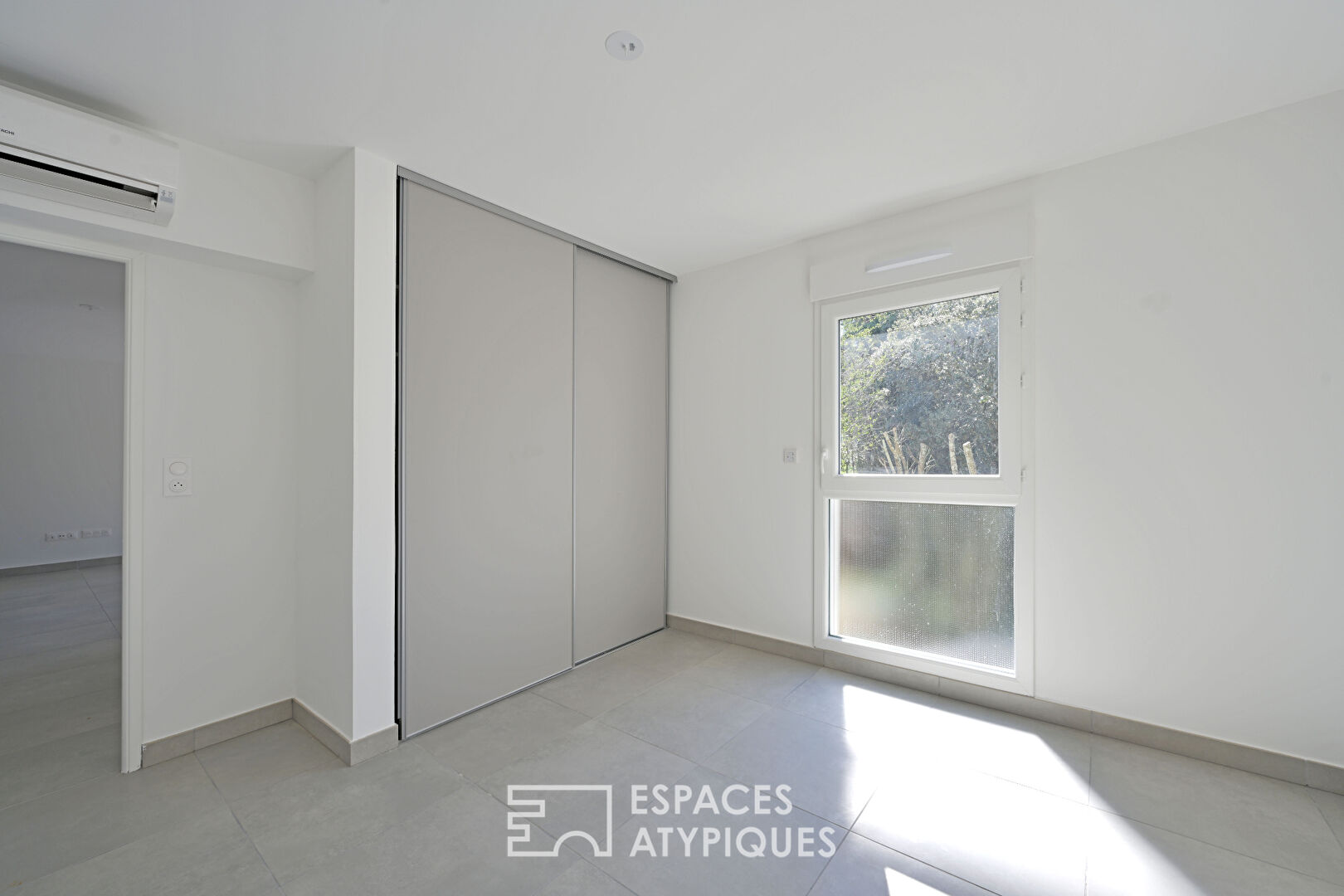 Appartement P2 avec terrasse, garage et ascenseur quartier Camplanier