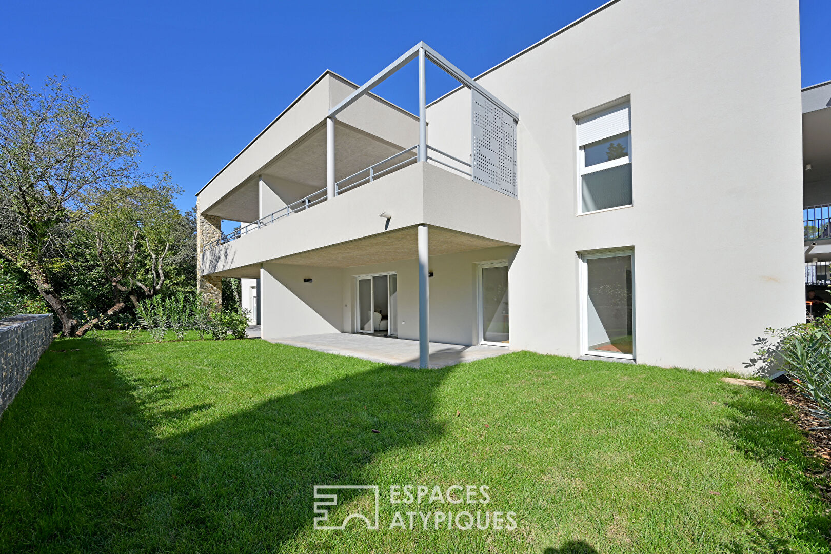 Appartement P3 avec jardin, garages et ascenseur quartier Camplanier